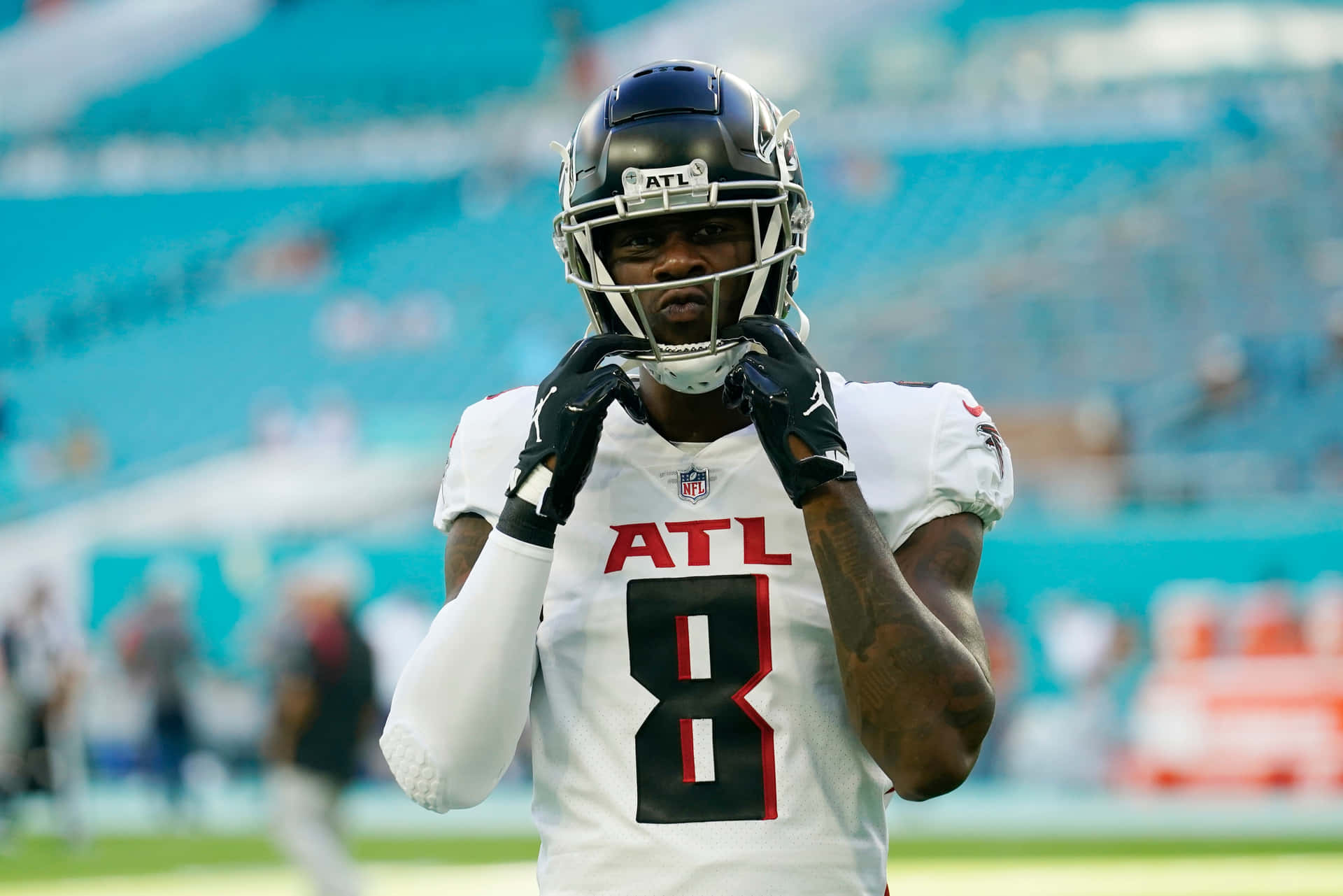 Atlanta Falcons Player Adjusting Helmet Wallpaper