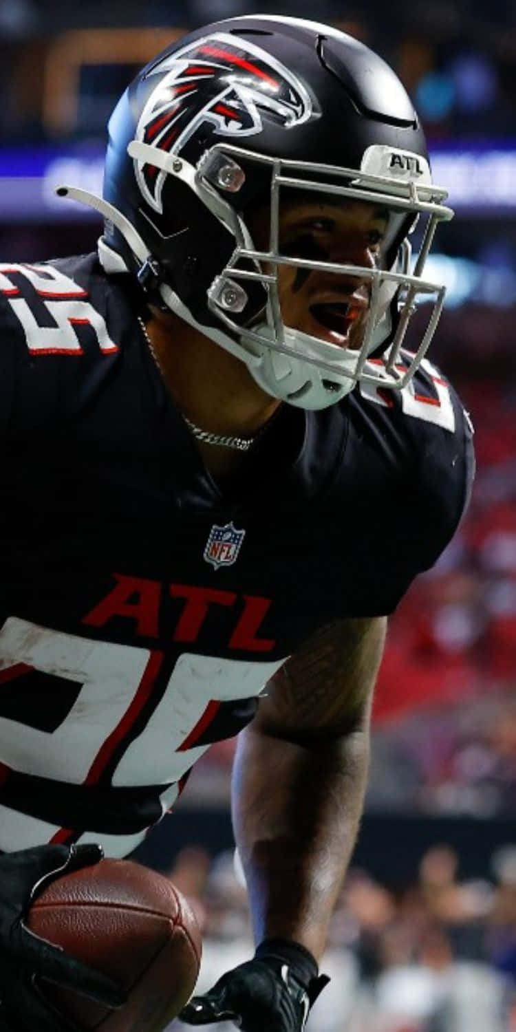 Atlanta Falcons Player In Action Wallpaper