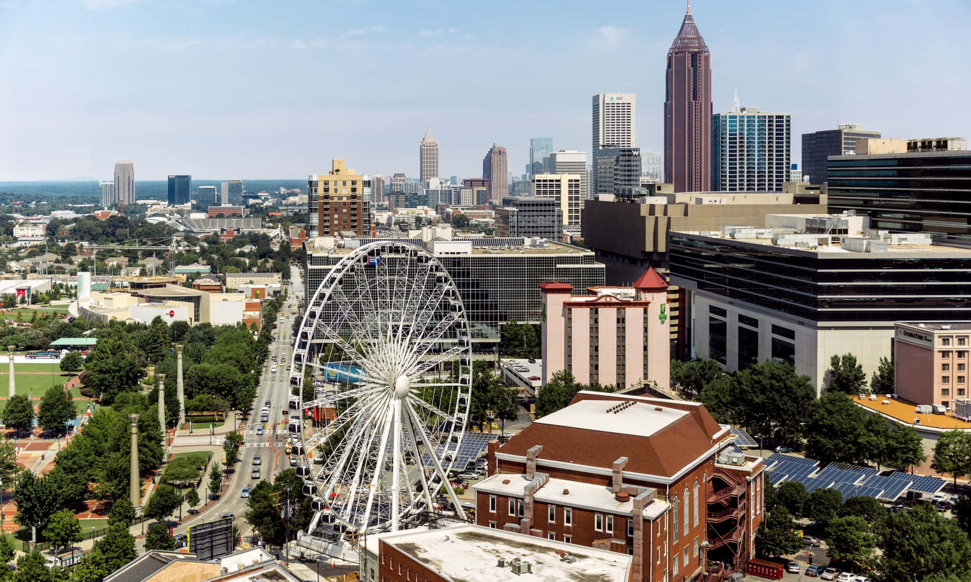 Atlanta City Center With Ferris Wheel And City Skyline