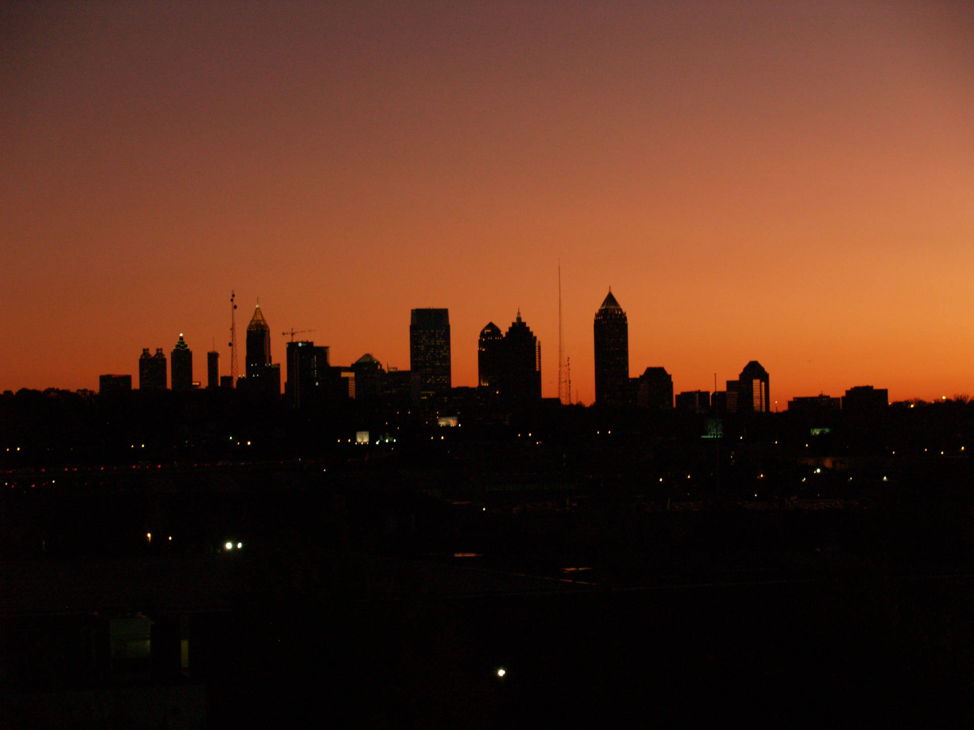 Caption: Spectacular Atlanta Skyline Silhouette at Twilight. Wallpaper