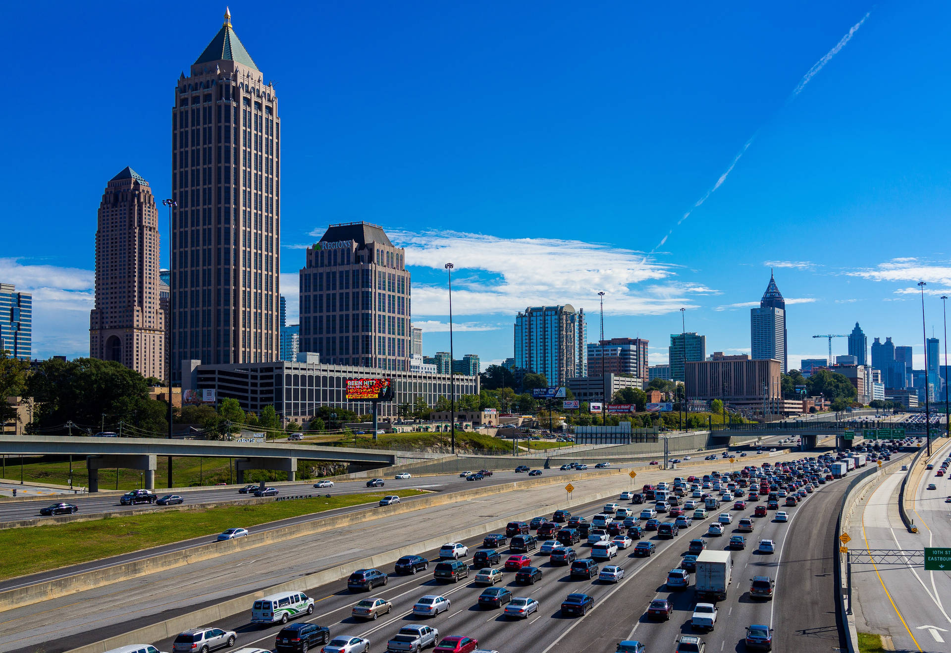 Atlanta Skyline With Busy Roads Background