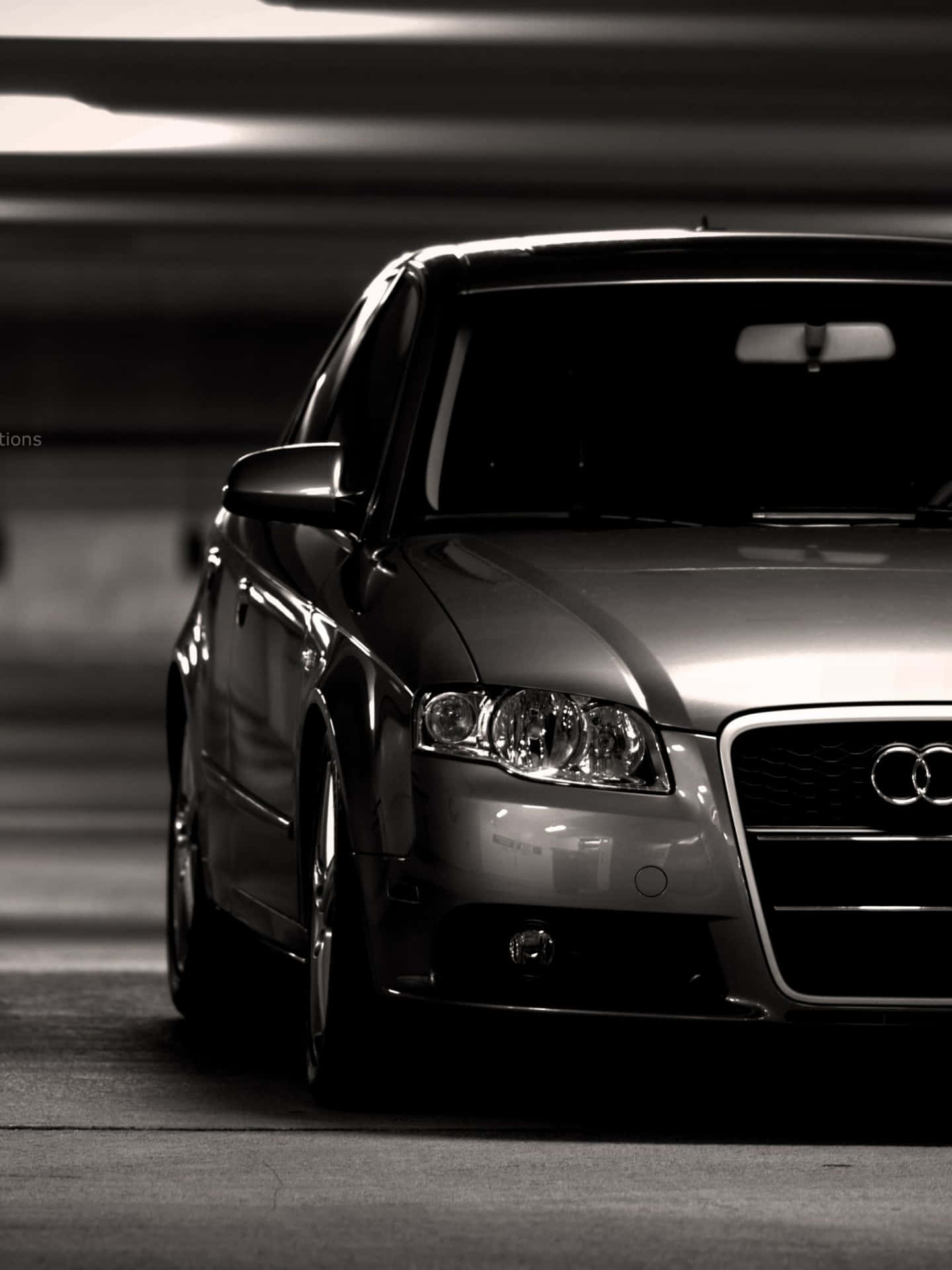 Caption: Sleek and Sophisticated Audi A4 in Action Wallpaper