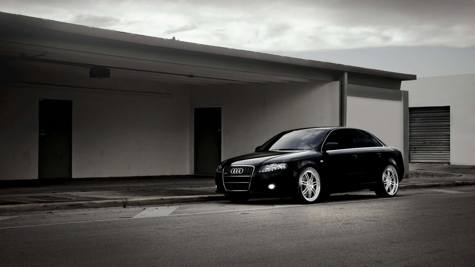 Sleek and Elegant Audi A4 in Urban Environment Wallpaper