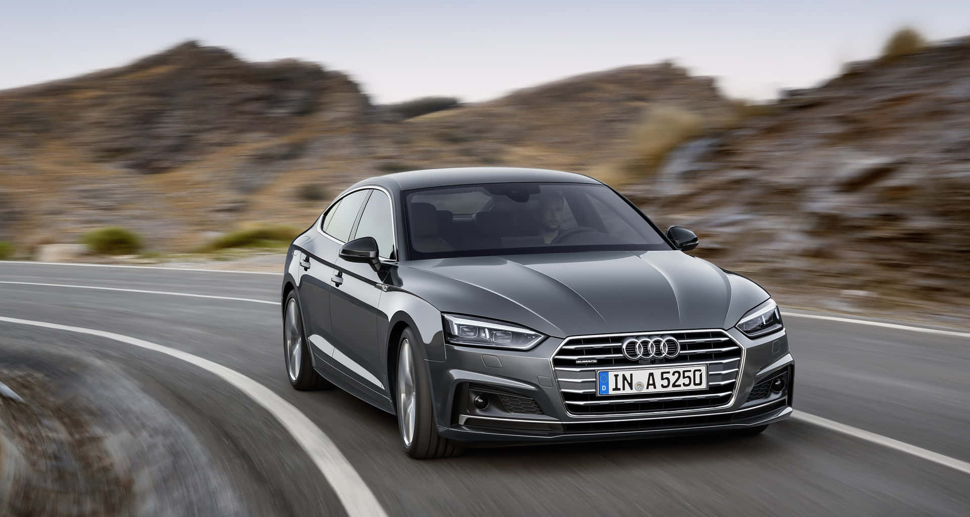 Sleek and Stylish Audi A5 in Motion Wallpaper