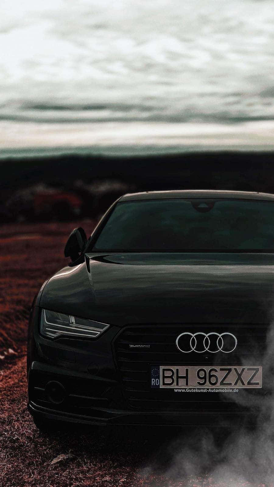 Et lækkert Audi iPhone koncept for teknologibegejstrede bilentusiaster. Wallpaper