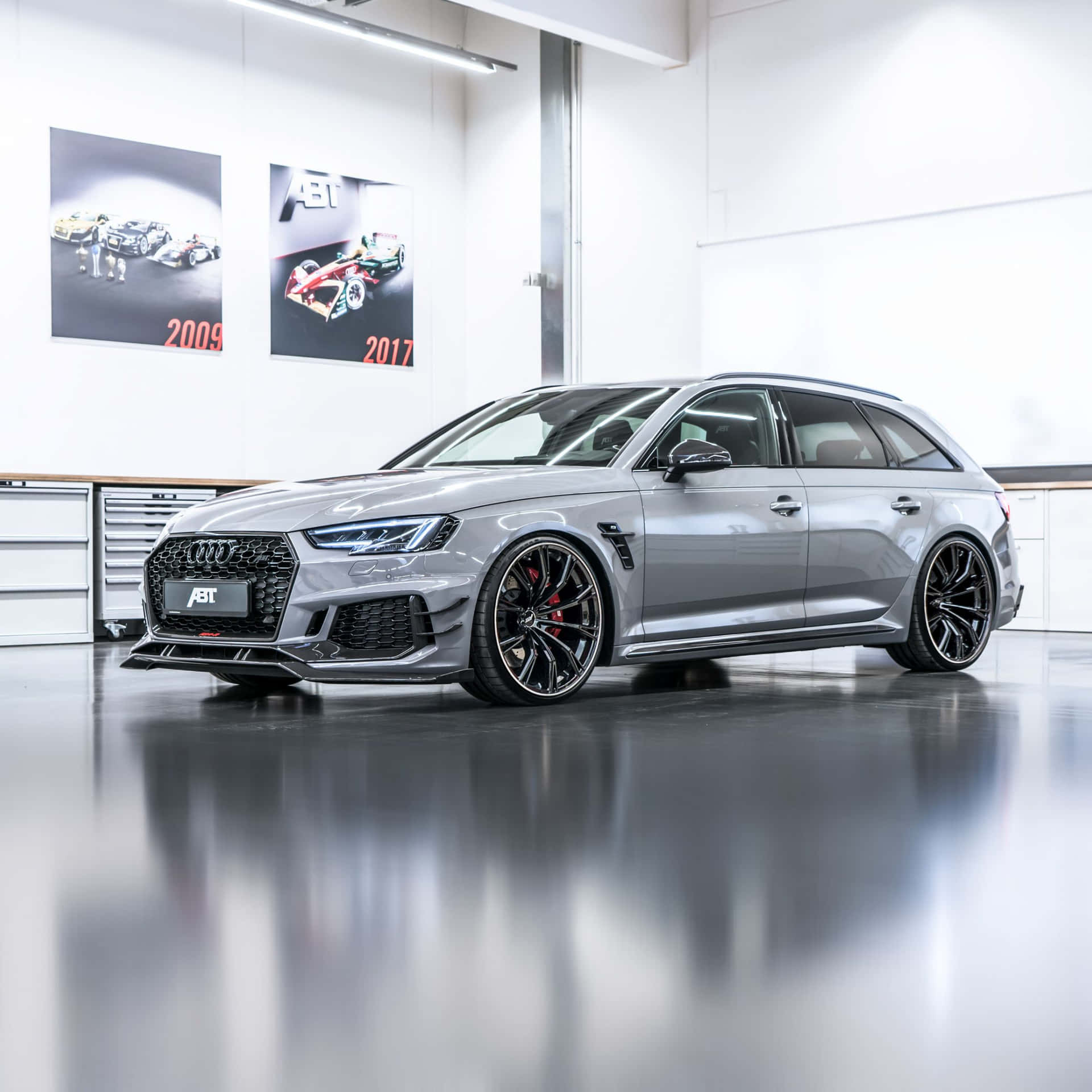 Sleek and Powerful Audi RS4 in Action Wallpaper