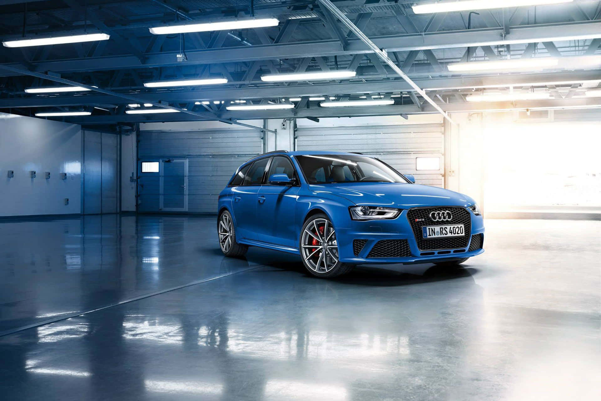 The Sleek and Stylish Audi RS5 Coupe in Motion Wallpaper