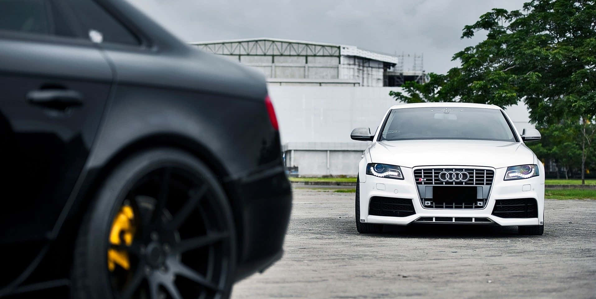 Sleek and Powerful Audi S4 in Motion Wallpaper