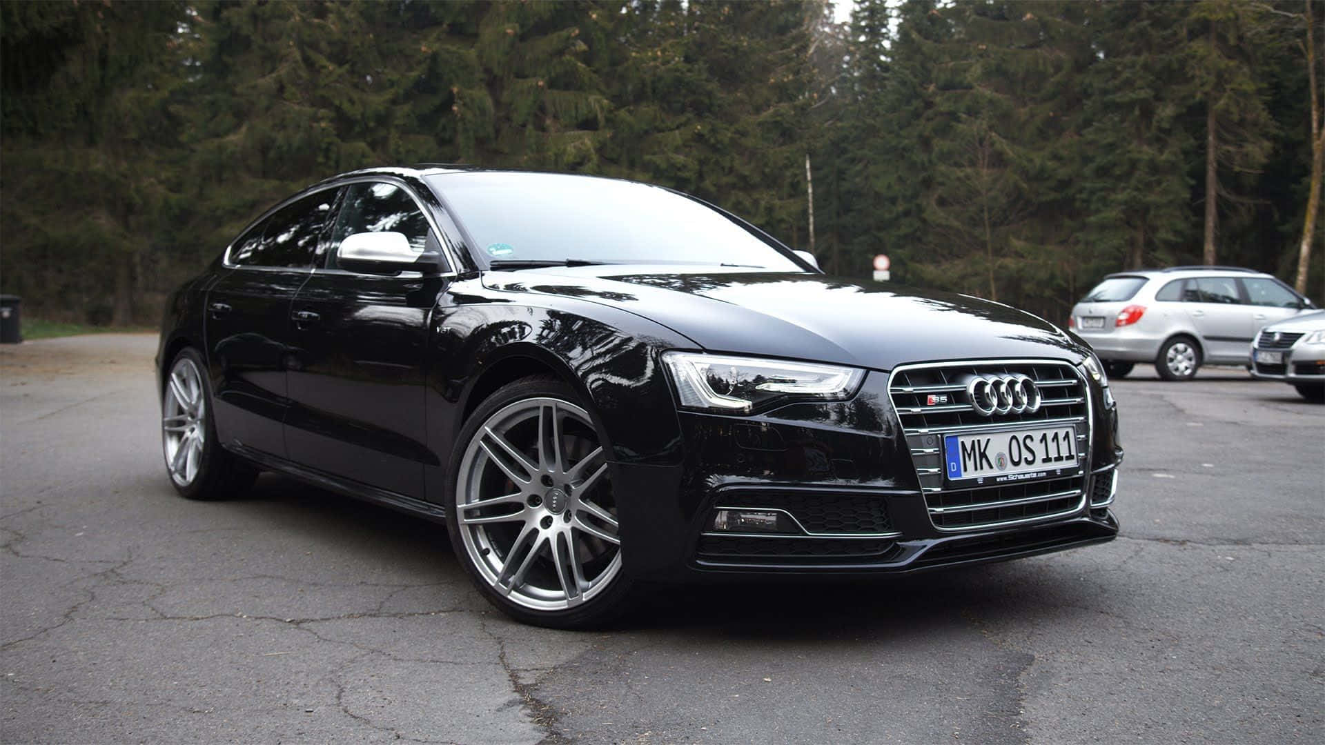 Luxurious Audi S6 in Motion Wallpaper