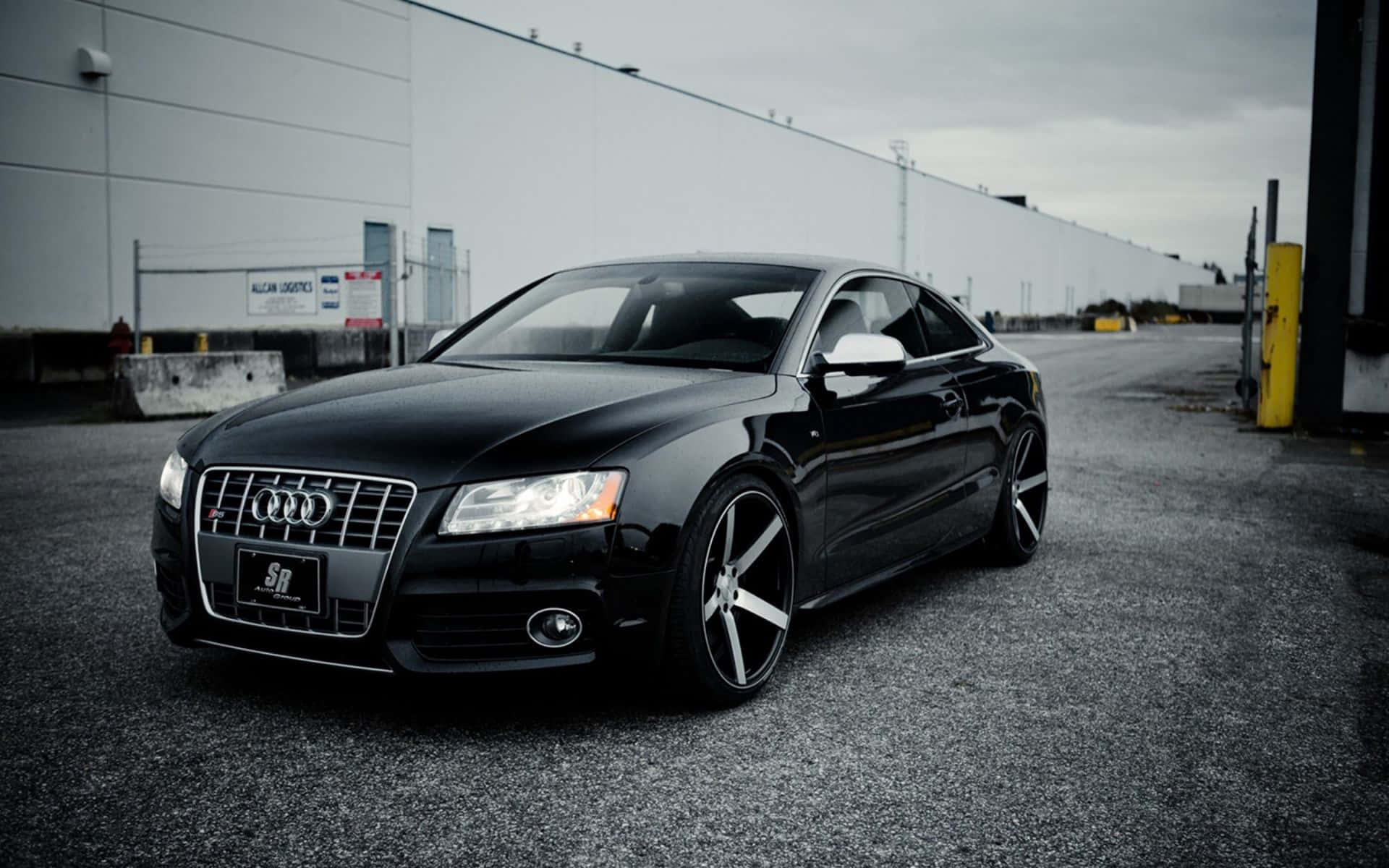 Sleek Audi S6 on an Open Road Wallpaper