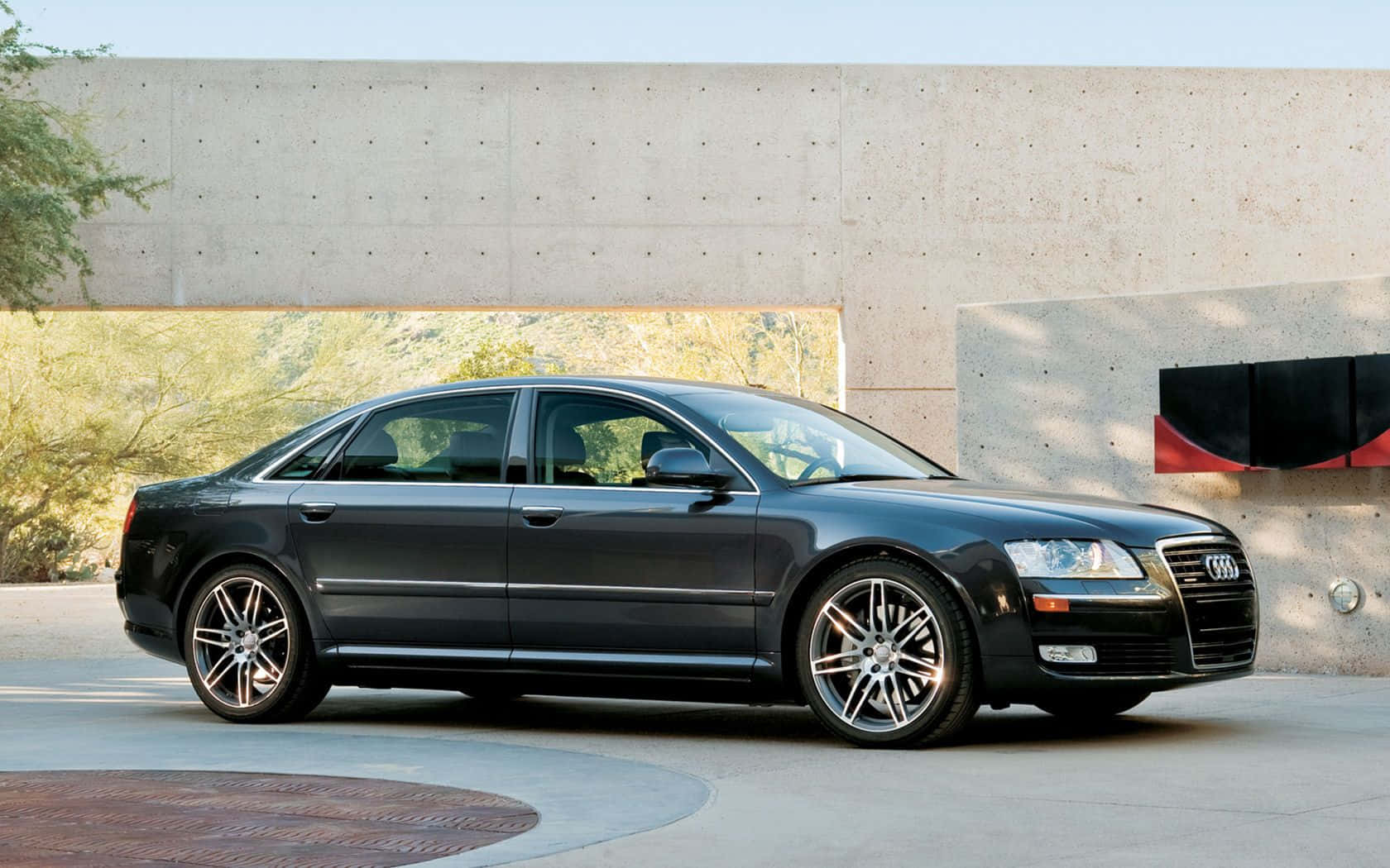 Sleek and powerful Audi S8 on the open road Wallpaper