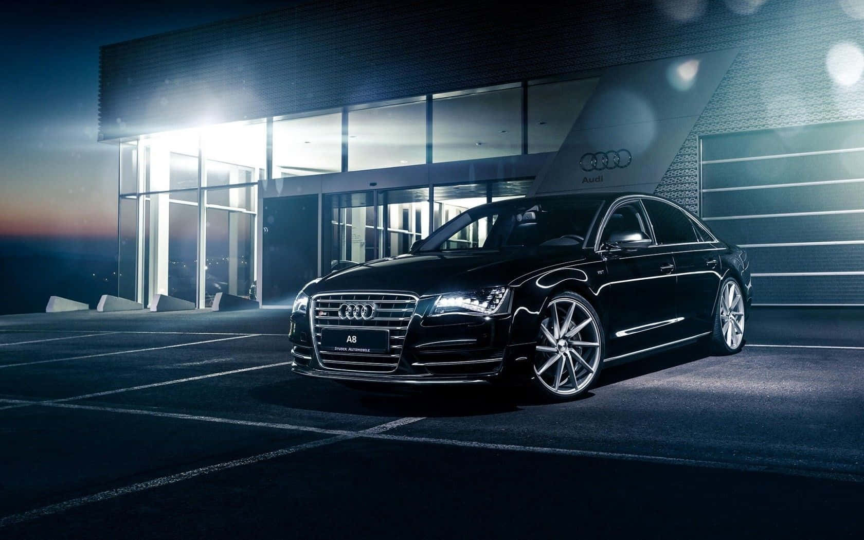 Sleek and Powerful Audi S8 in Motion Wallpaper
