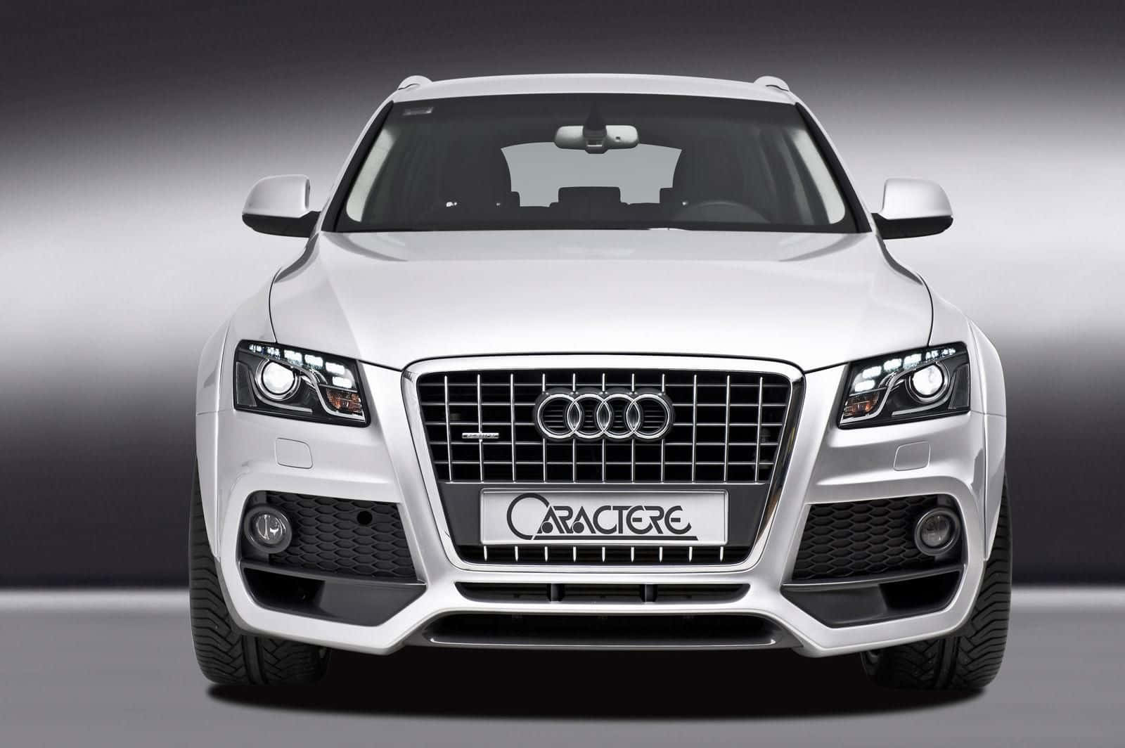 Stunning Audi SQ5 cruising down the highway Wallpaper