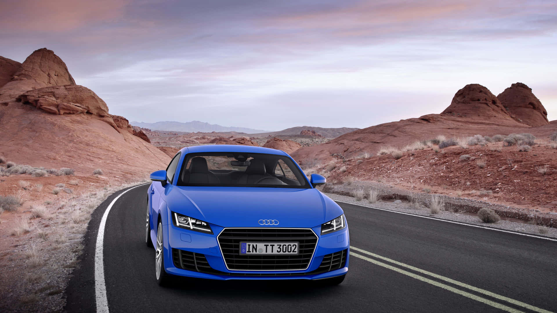 Stunning Audi TT Sports Coupe in Action Wallpaper