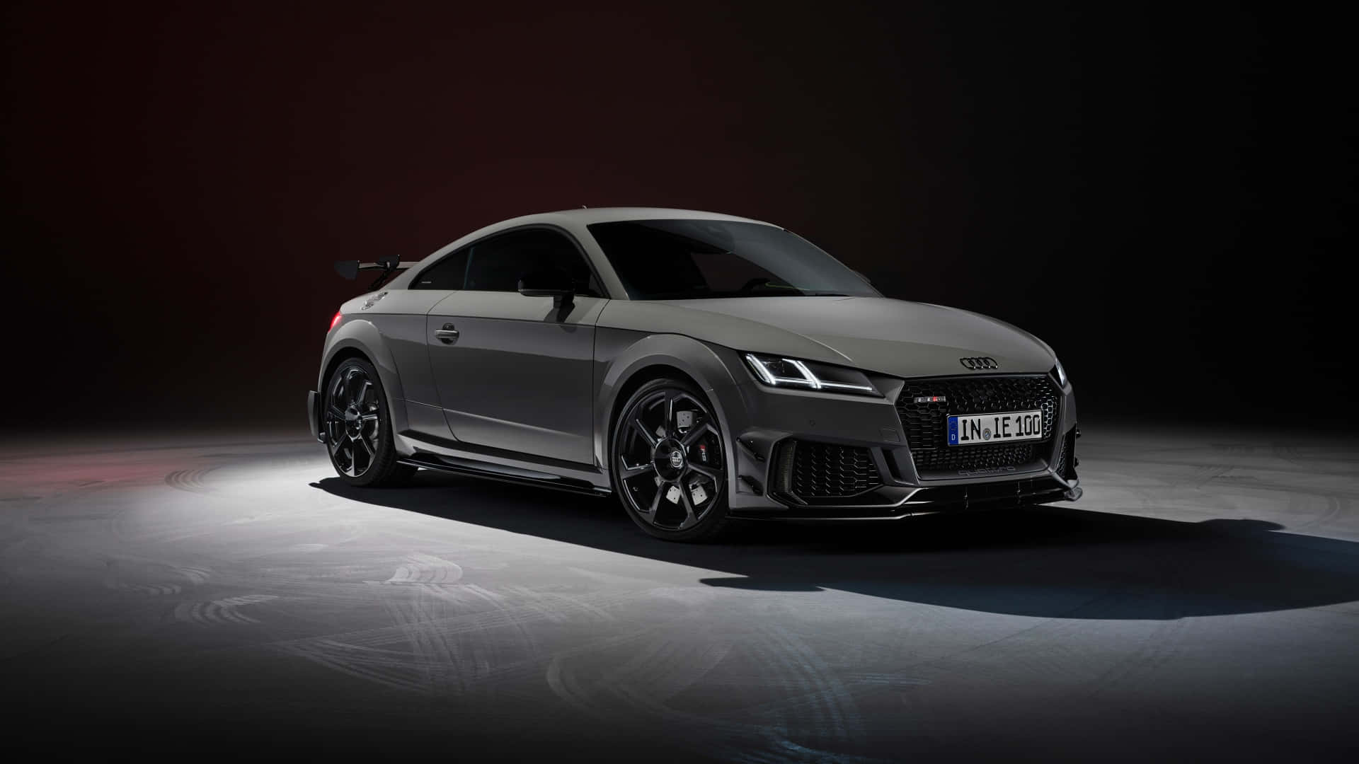 Sleek and Powerful Audi TT RS on the Road Wallpaper