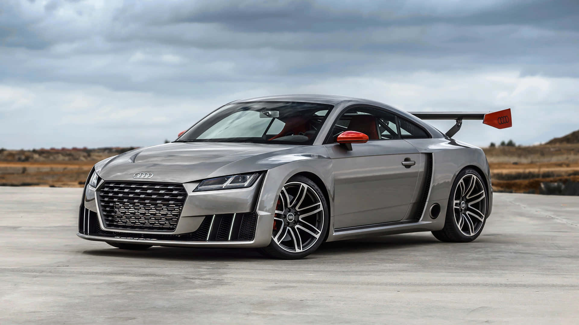 A Stunning Audi TT RS Sports Coupe on the Road Wallpaper