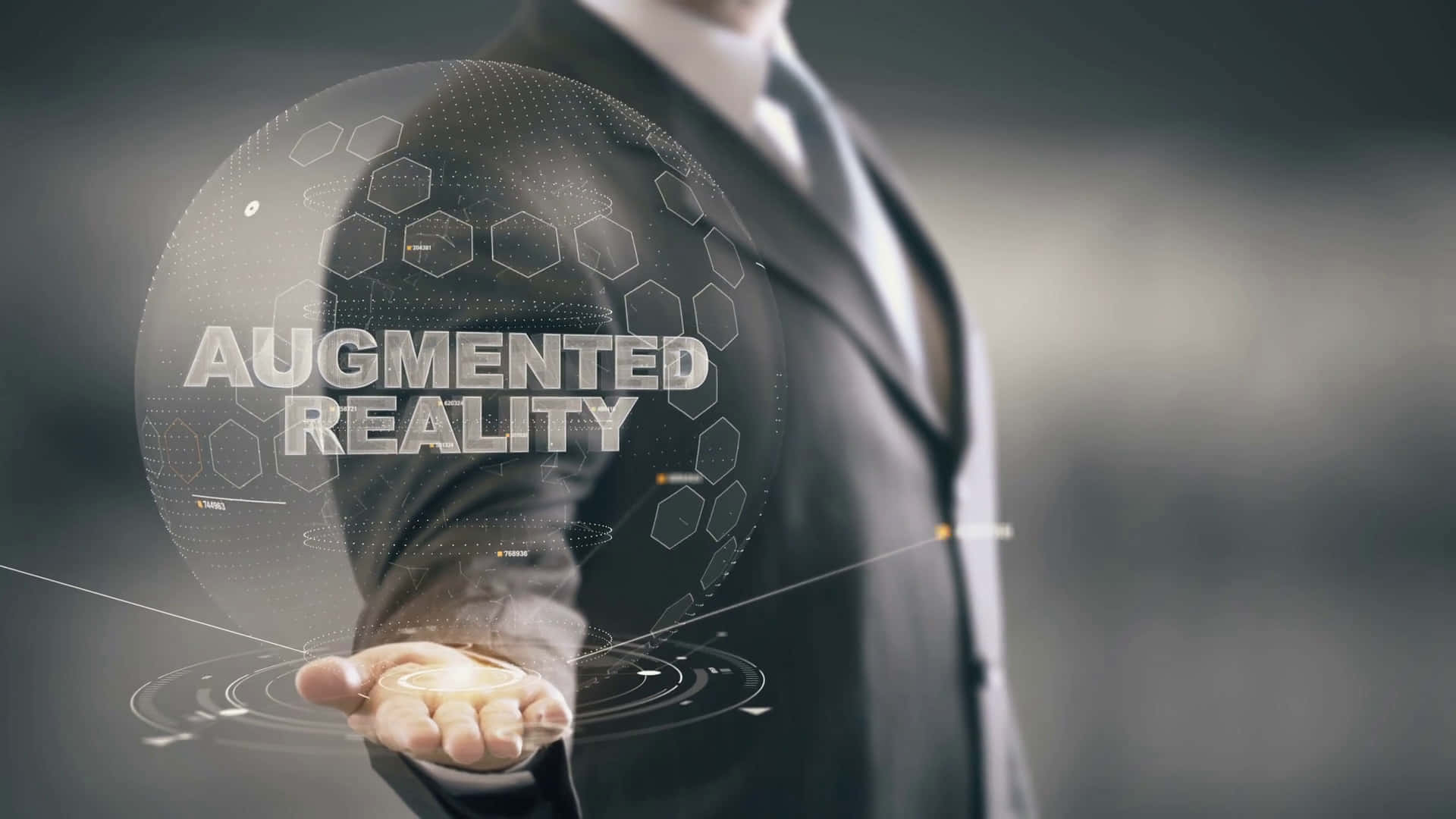 A Man In A Suit Is Holding A Virtual Reality Device Wallpaper