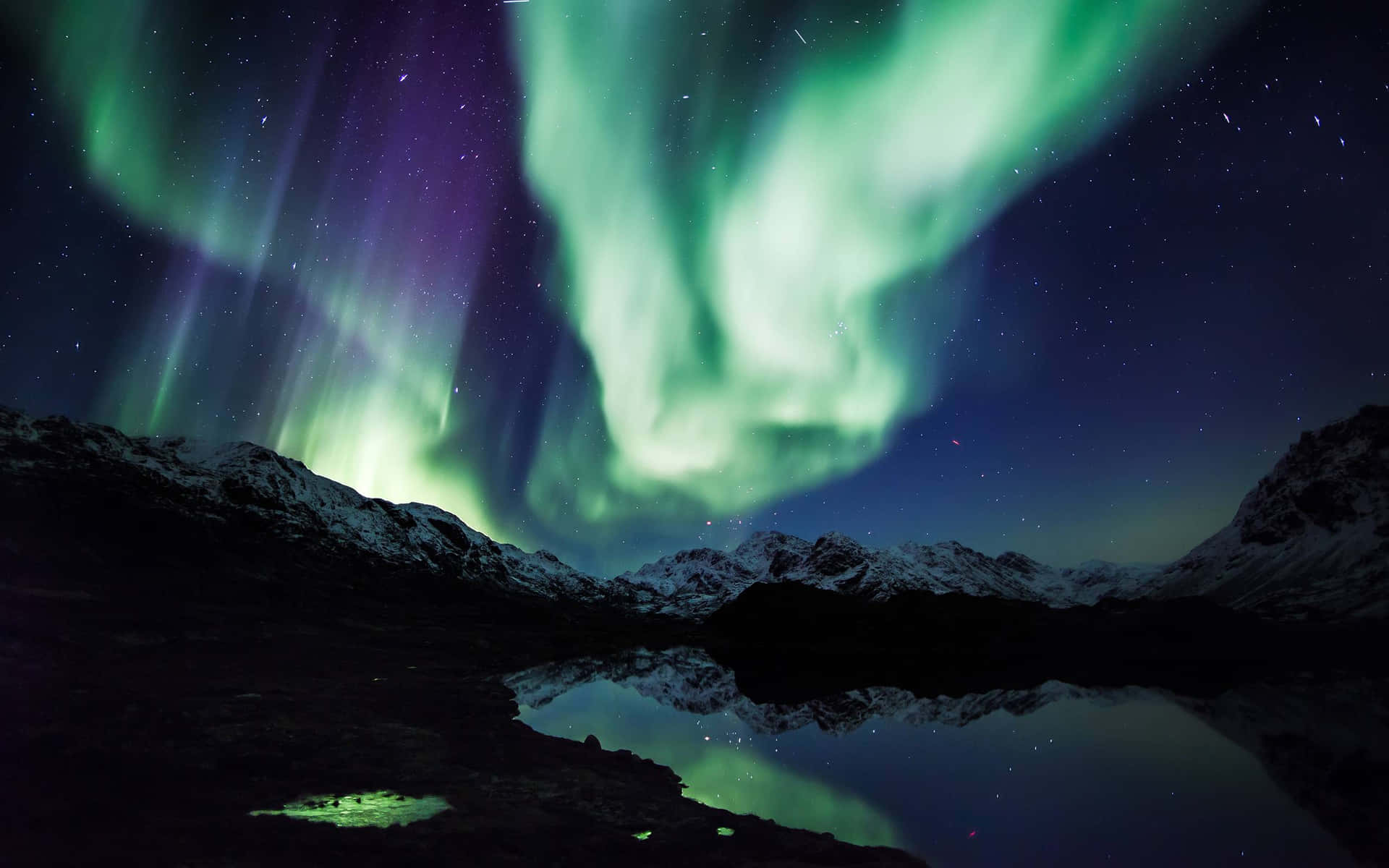 A Majestic Display of the Aurora Borealis Wallpaper
