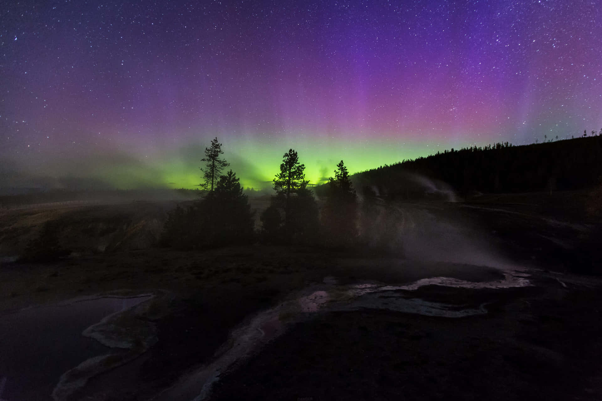 Aurora_ Over_ Geothermal_ Features_ National_ Park Wallpaper