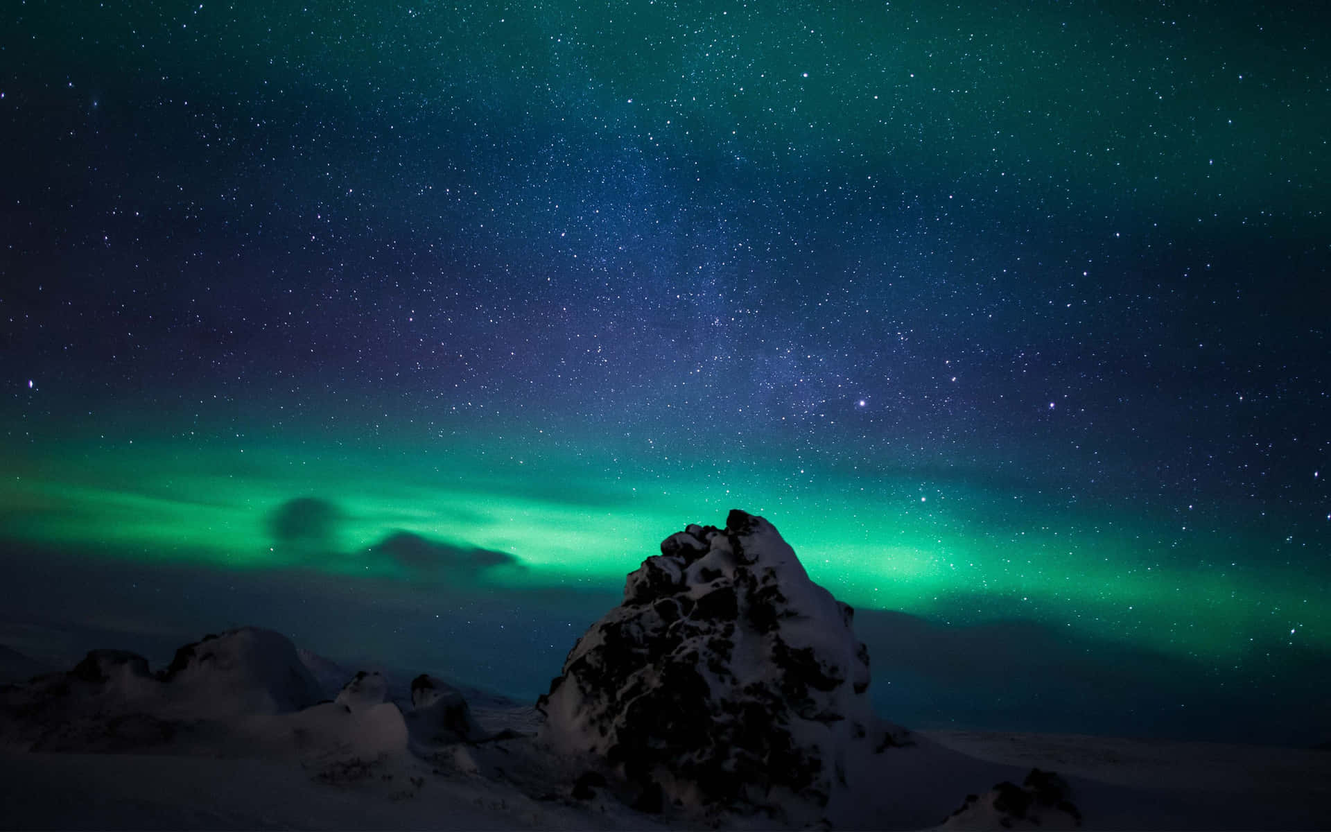 The emergence of an Aurora lights up the night sky