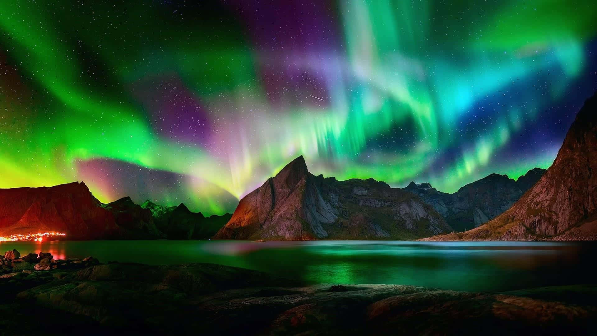 The Aurora Borealis ornates the night sky with mesmerizing light