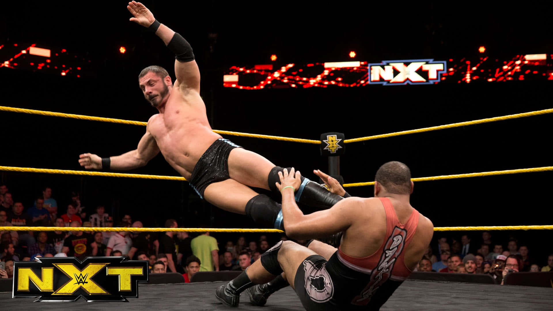 Austin Aries Dominating NXT Match Wallpaper