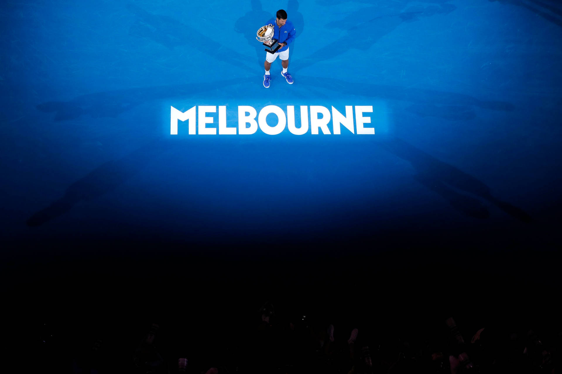 Australian Open Champion Holding Trophy Background
