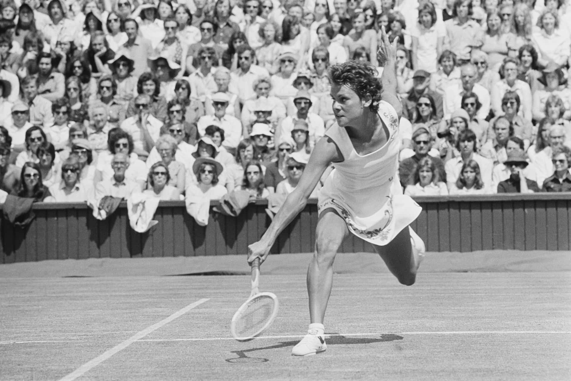 Evonne Goolagong Cawley, dynamic Australian Tennis Player in action—Greyscale Snapshot Wallpaper