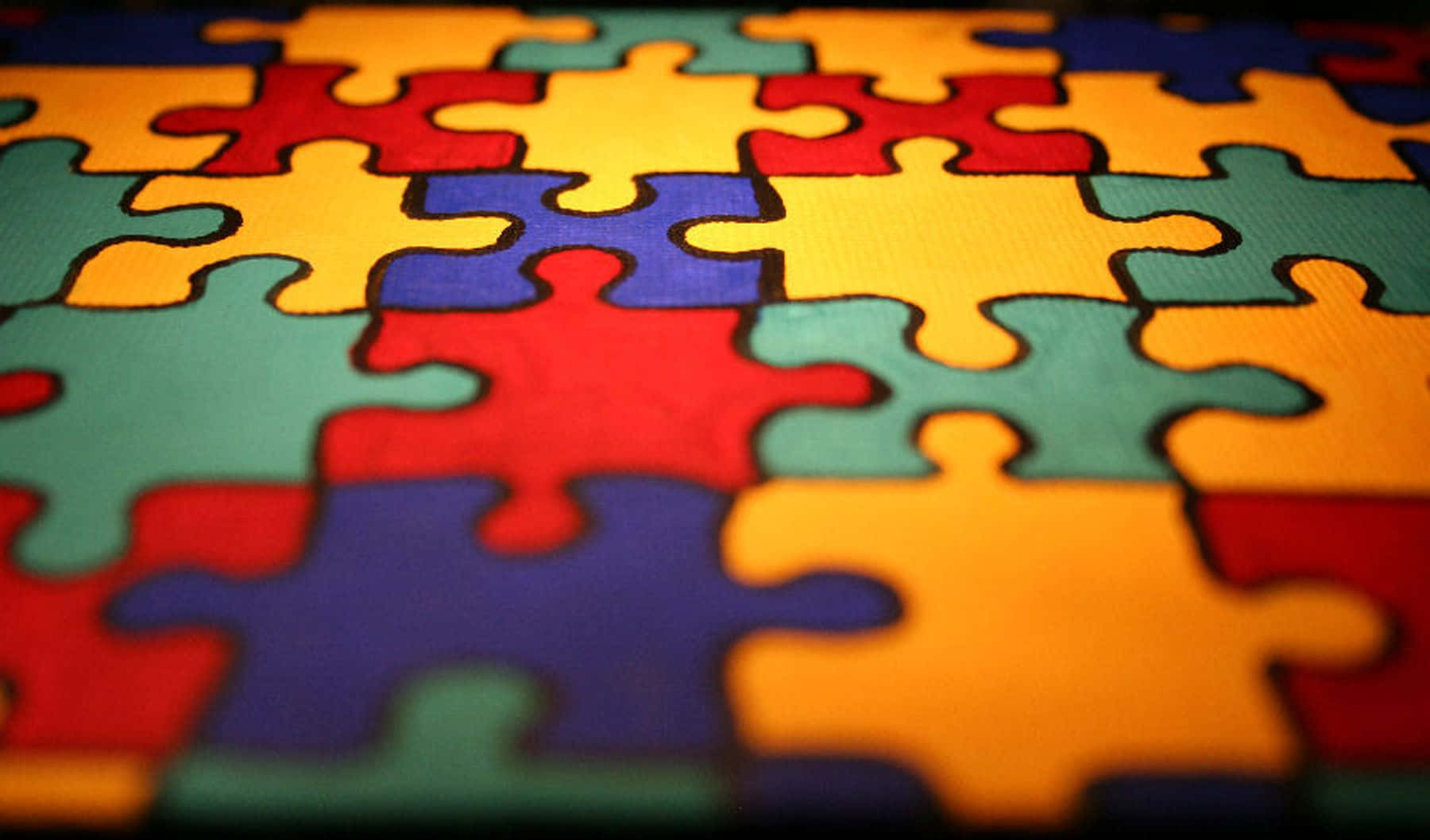 Autism Puzzle Pieces On A Table