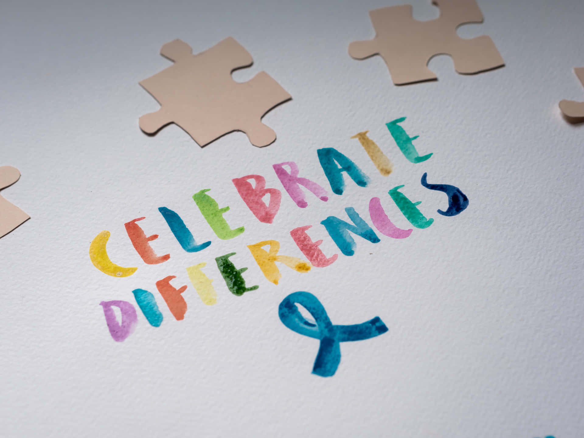 Celebrate Differences - A Puzzle With Blue Ribbon
