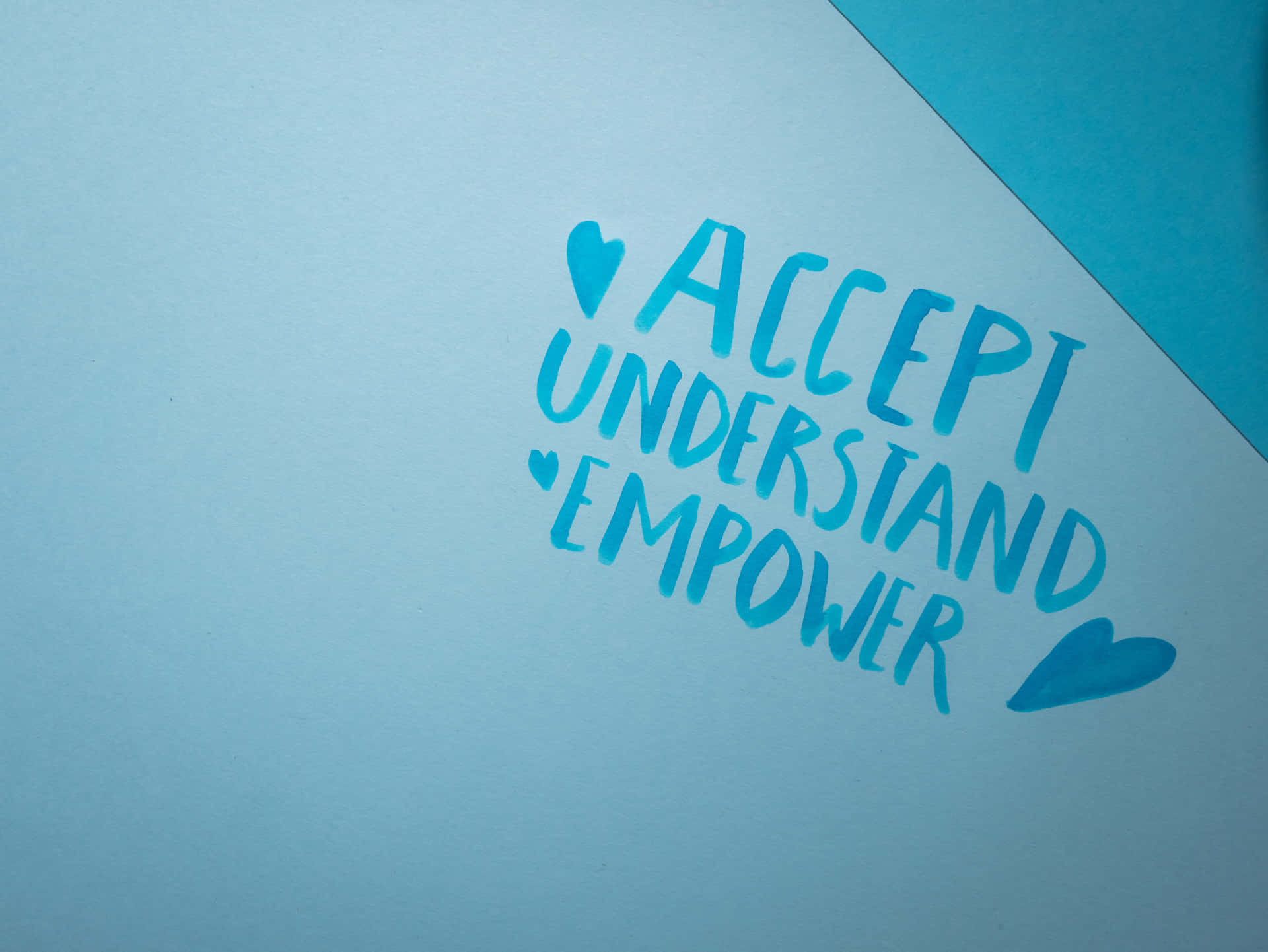 A Blue Paper With The Words Accept Understand Empower
