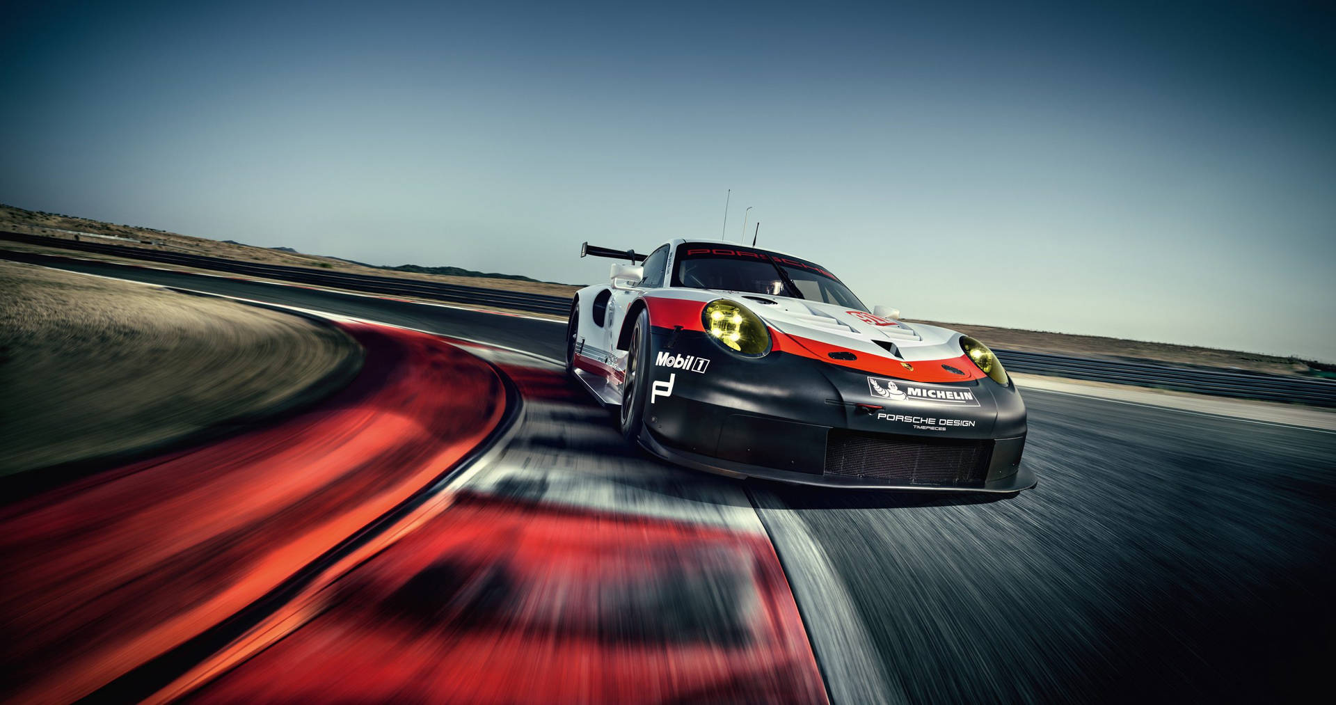 Auto Racing Car At Super Speed Wallpaper