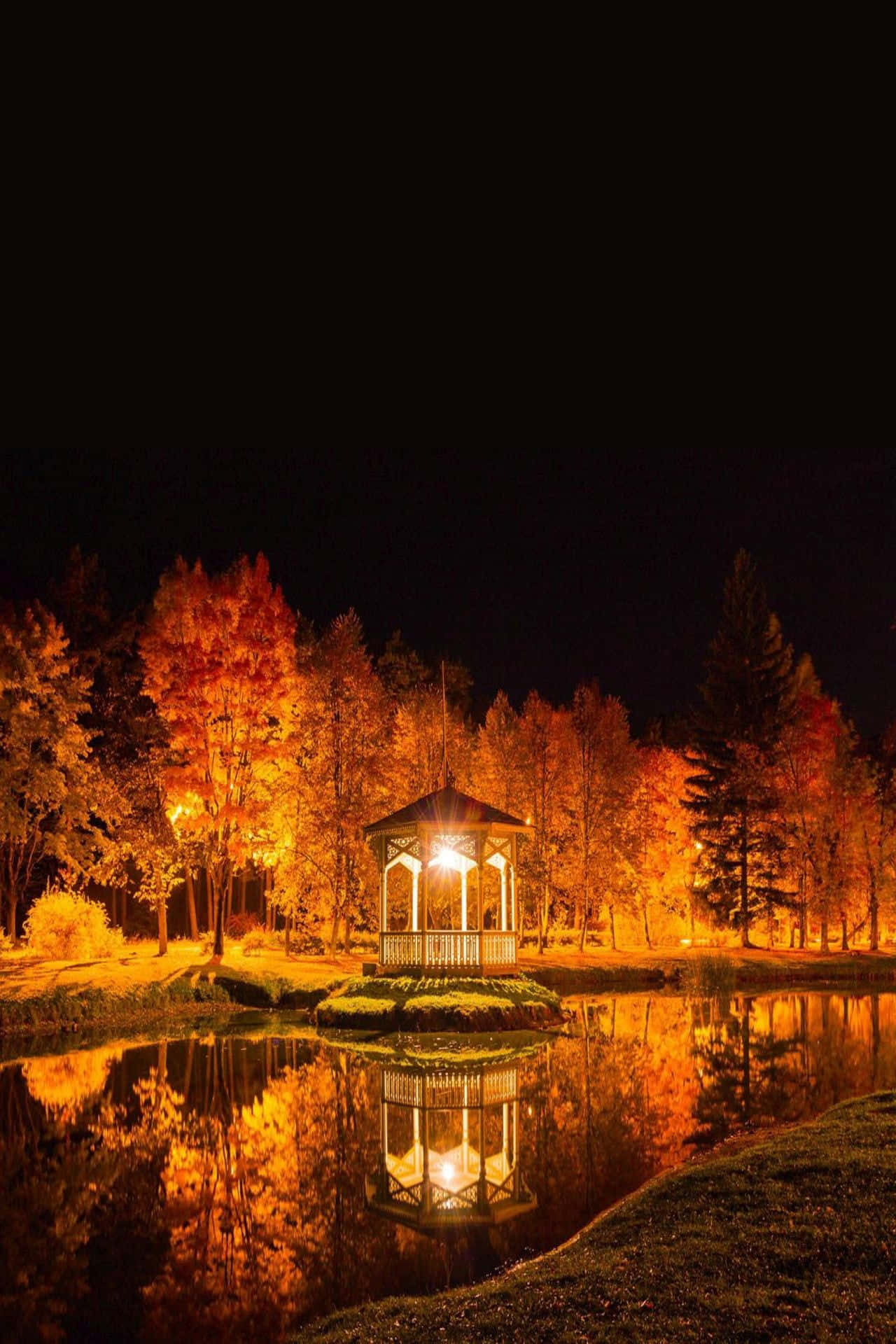 Serene Autumn Evening by the Lake Wallpaper