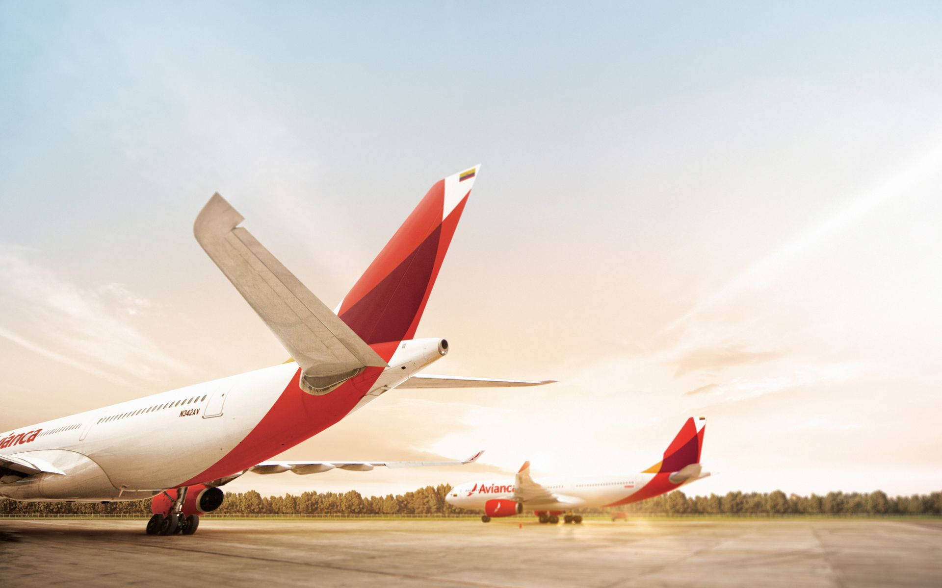 Avianca Airline Planes At Sunset Wallpaper