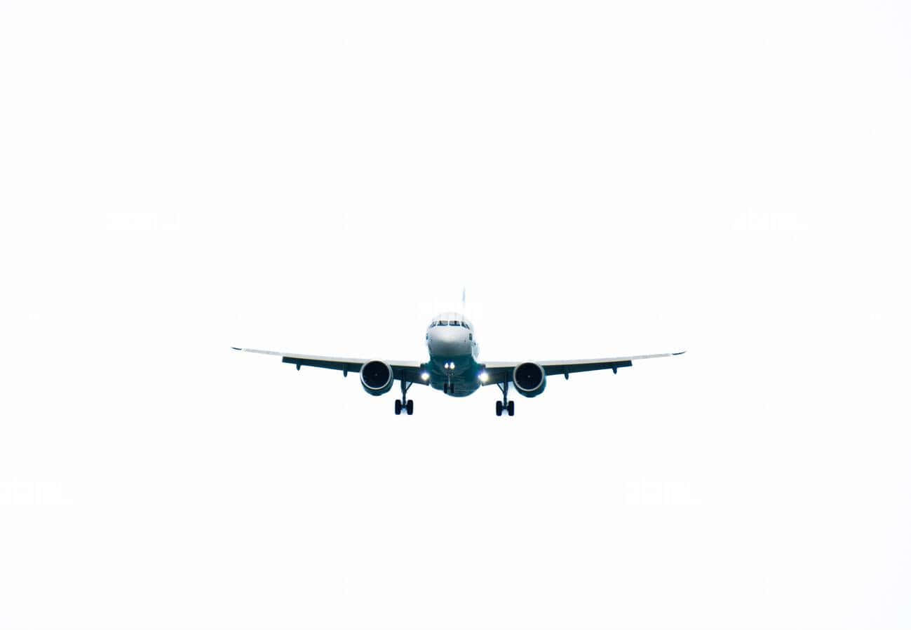 A Passenger Jet Flying In The Sky