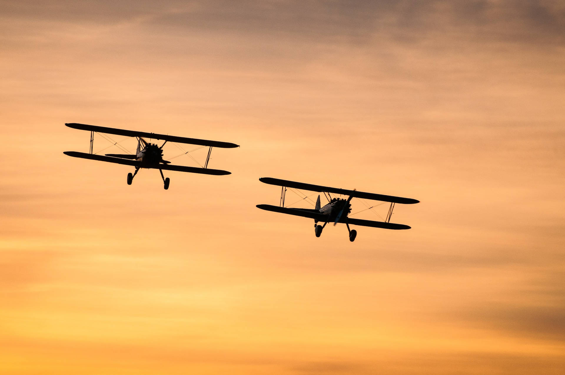 Aviation Black Silhouettes Of Two Biplanes Wallpaper