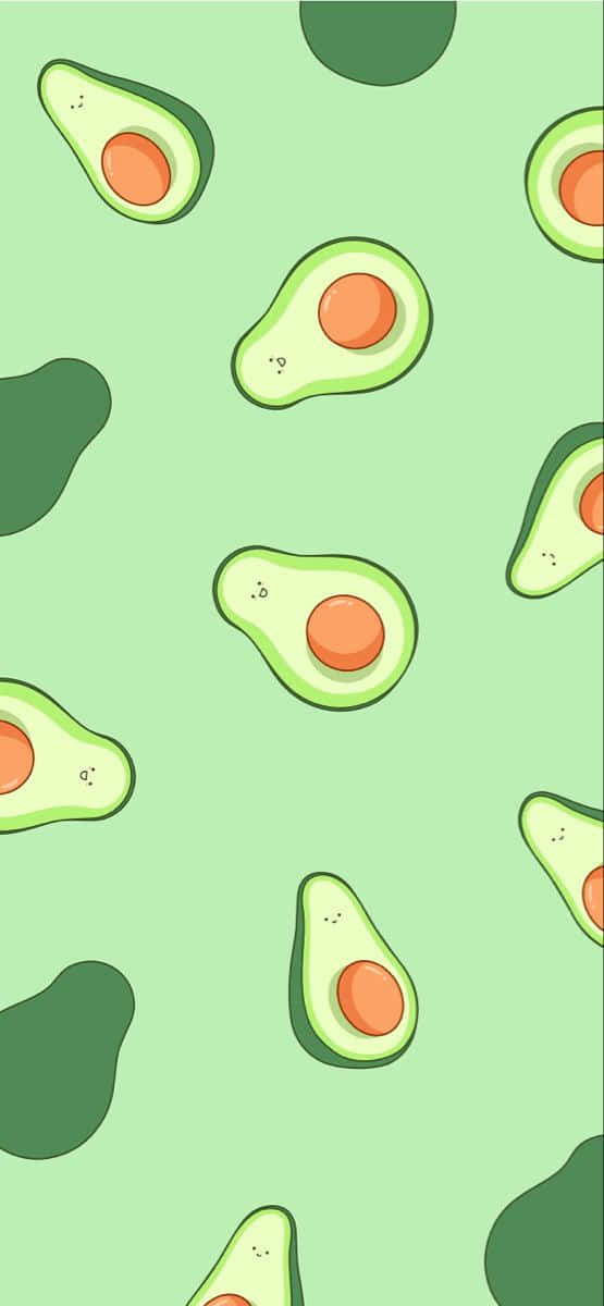 Avocado Seamless Pattern On A Green Background Wallpaper