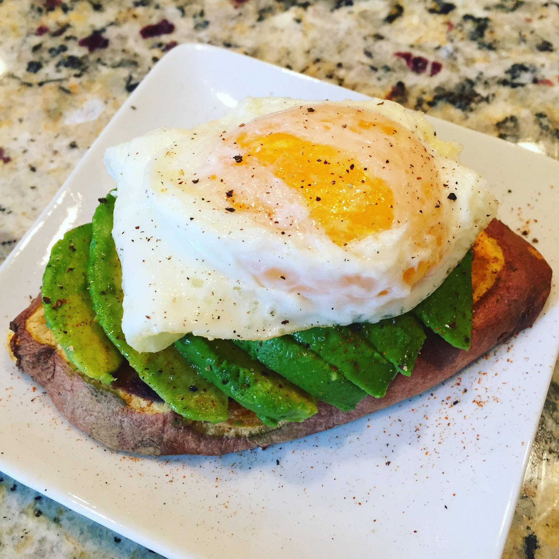Avocado Toast Topped With A Poached Egg Wallpaper