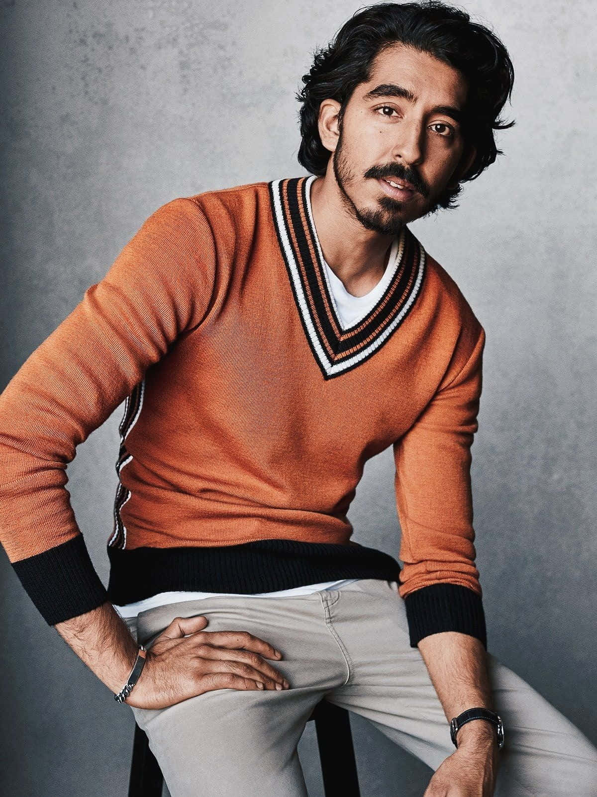 Award-winning Actor Dev Patel In An Expressive Pose Wallpaper