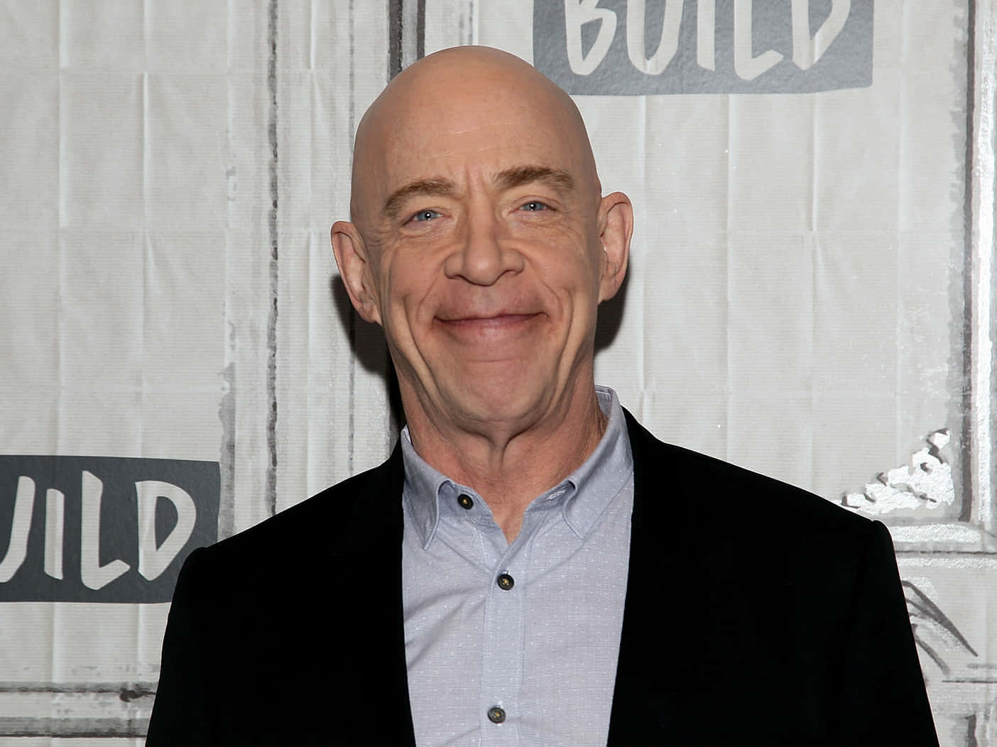 Award-winning Actor J.k. Simmons In A Poised Stance. Wallpaper