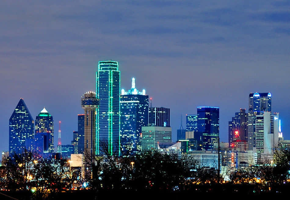 Awe-inspiring Dallas Skyline At Dusk Wallpaper