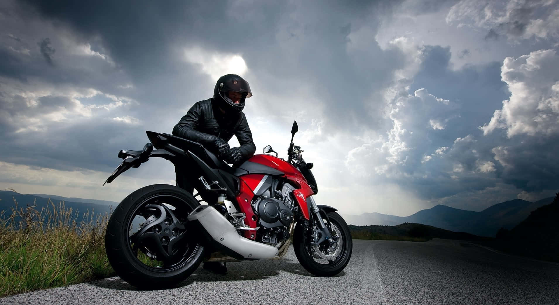 Awe-inspiring Honda Motorcycle In Full Speed Wallpaper