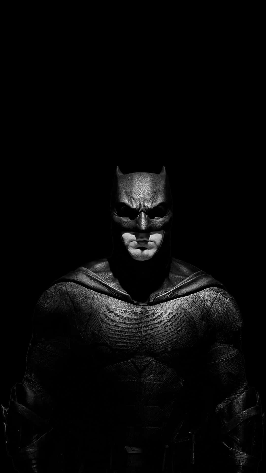 The Legendary Batman in the Spotlight Wallpaper