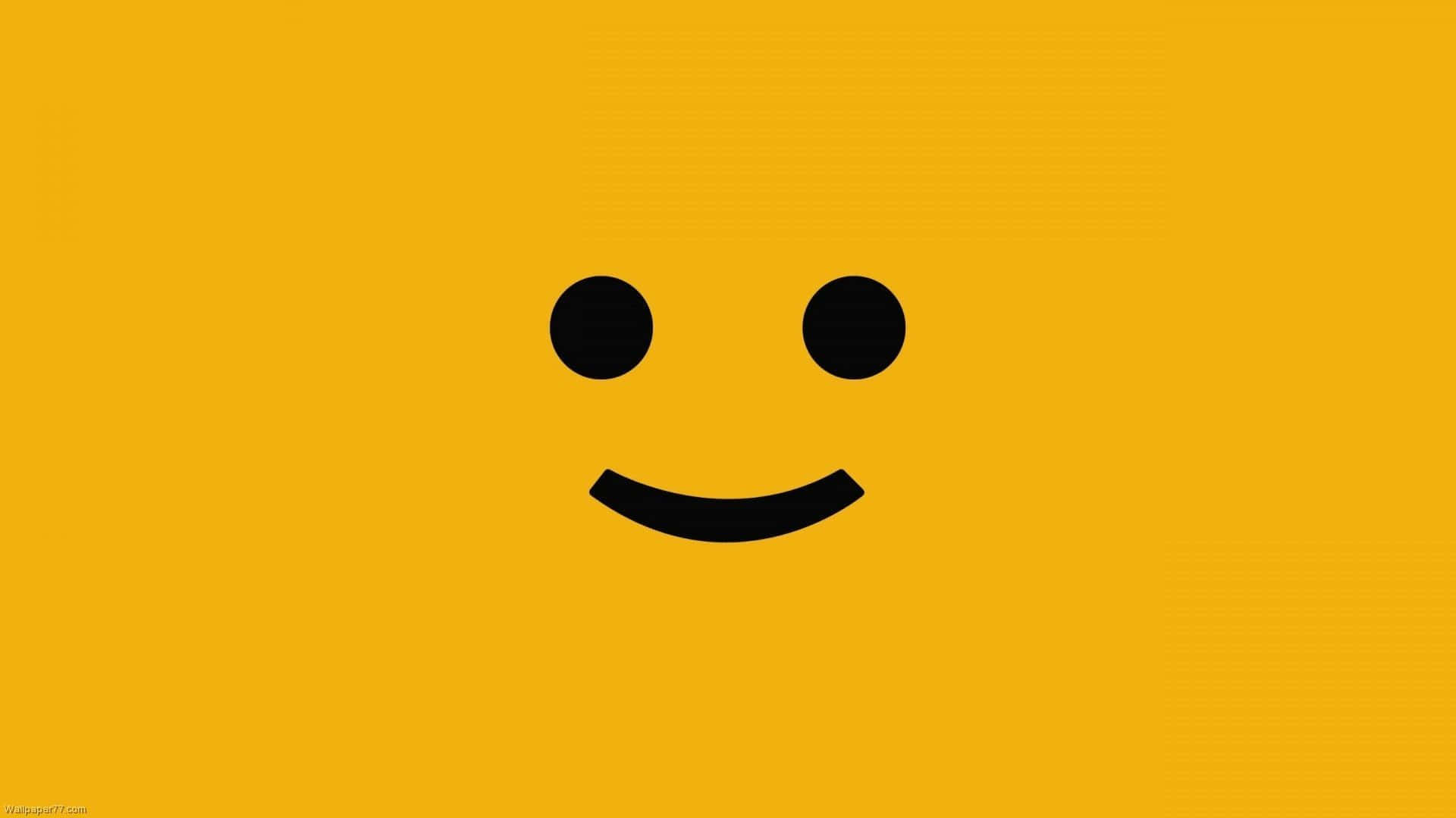 Unfondo Amarillo Con Una Cara Sonriente En Él Fondo de pantalla