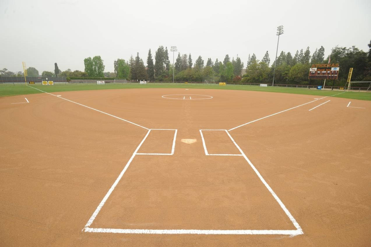 Awesome Softball Field On A Gloomy Day Wallpaper