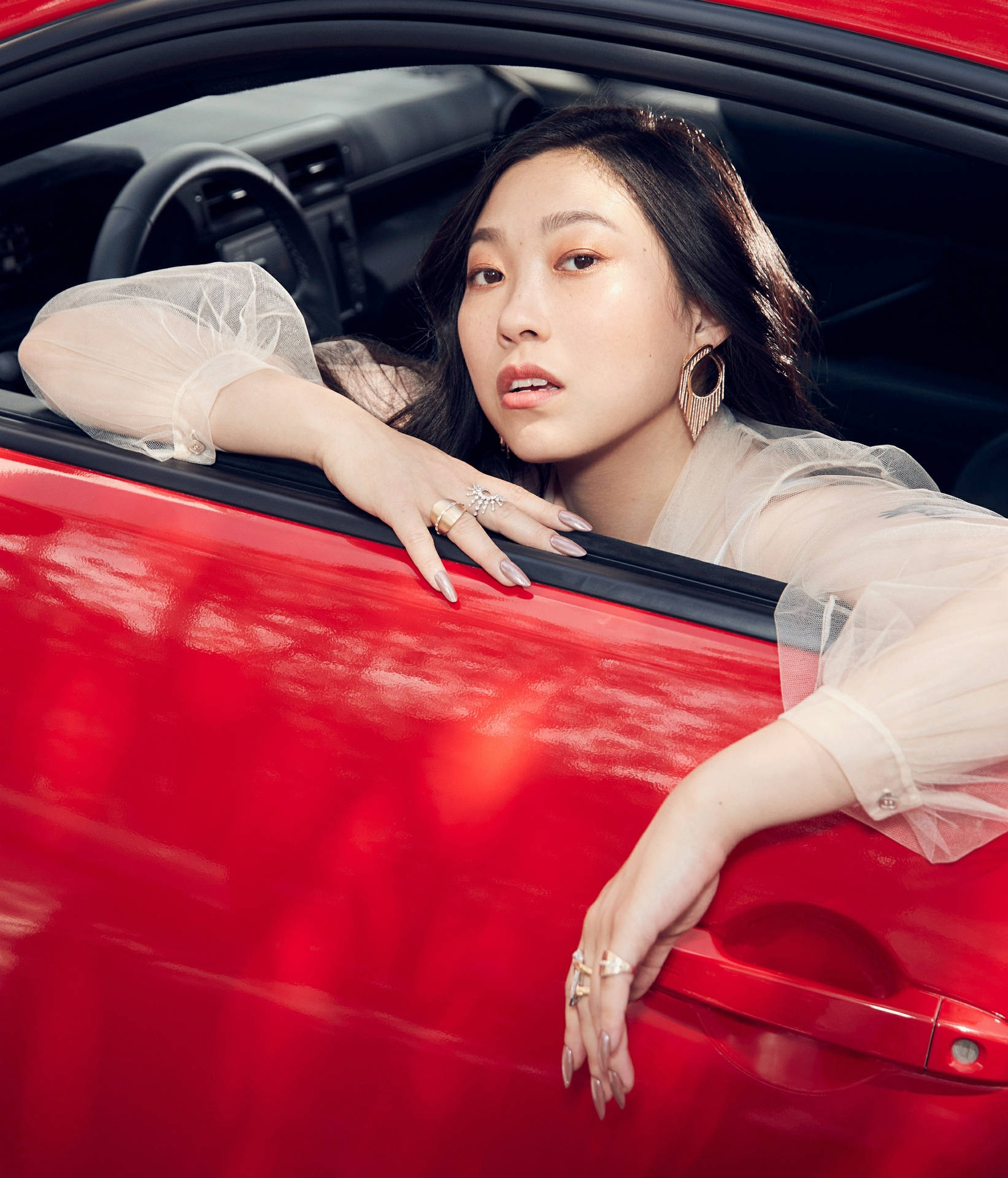 Awkwafina In Red Painted Car Wallpaper