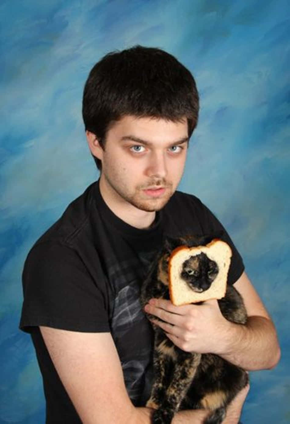 Boy With Awkward Cat Bread Picture