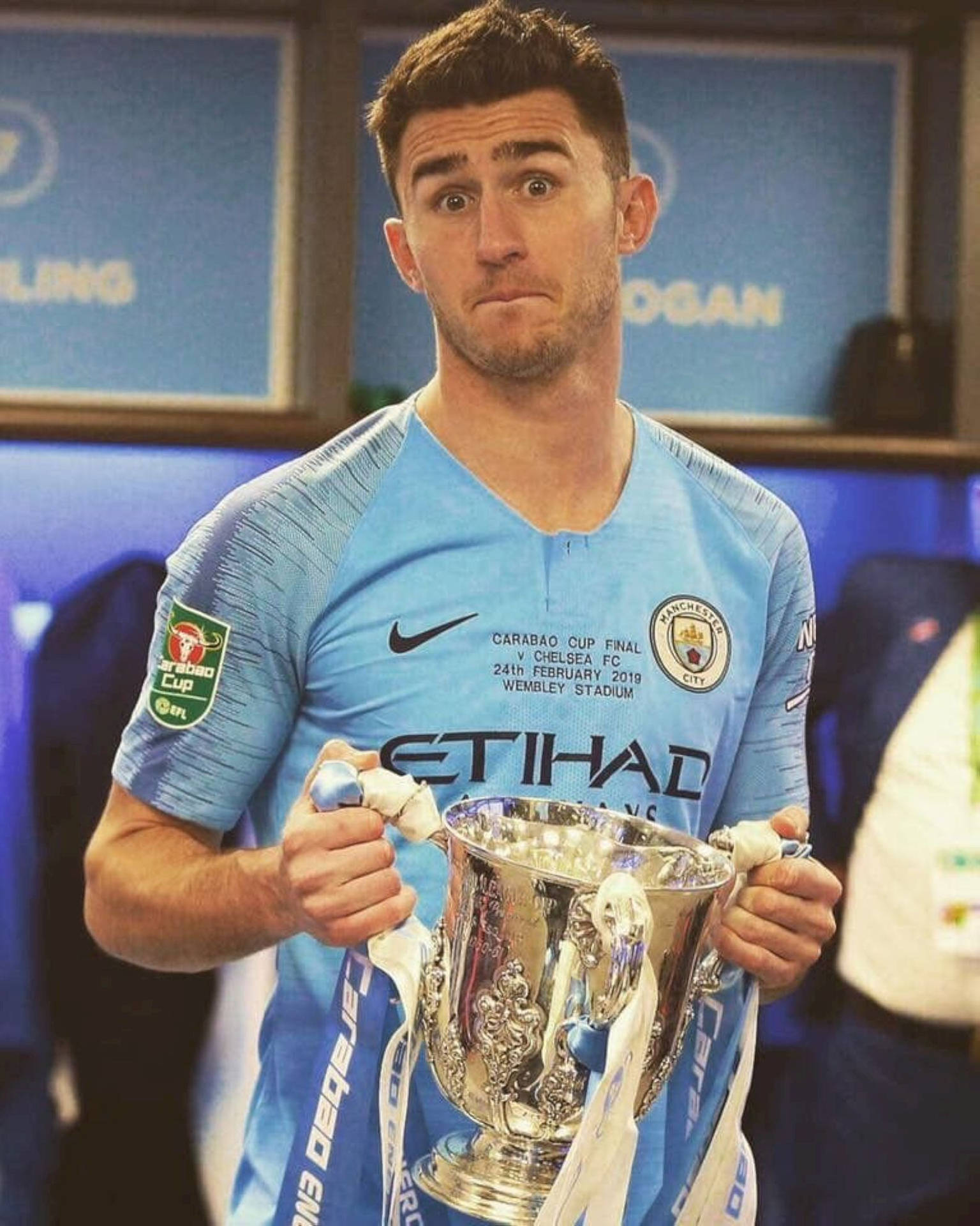Aymeric Laporte Holding Trophy Wallpaper