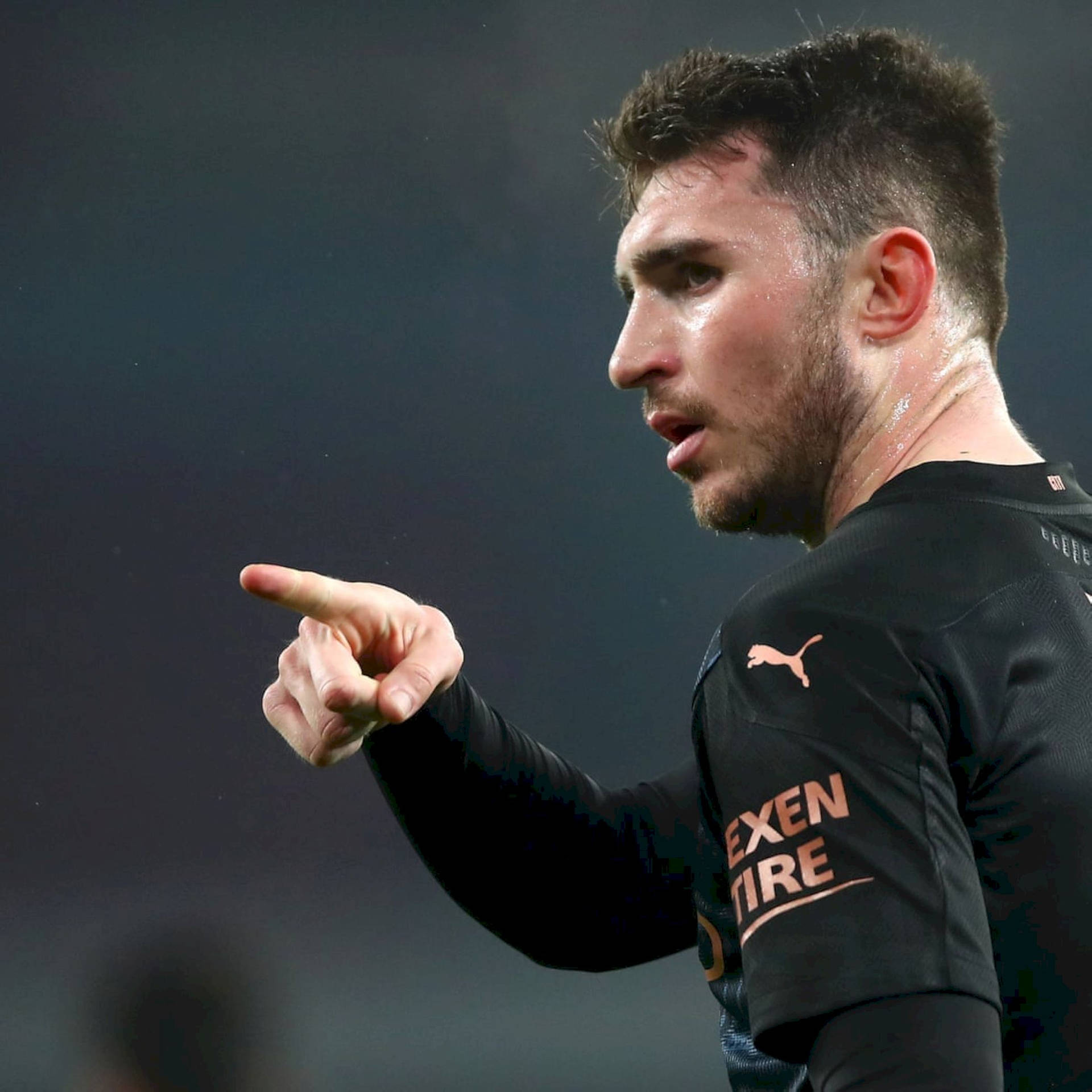 Aymeric Laporte Pointing To The Side Wallpaper