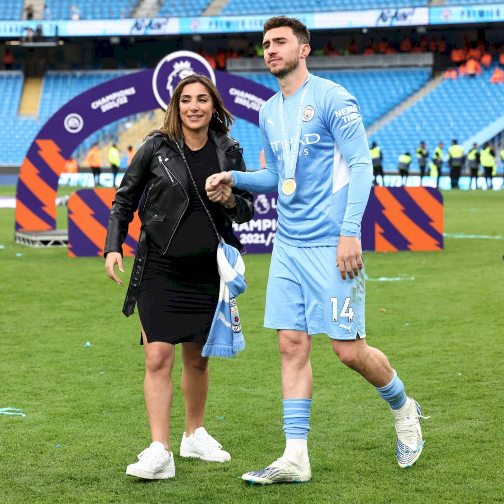 Aymeric Laporte With Woman On Field Wallpaper